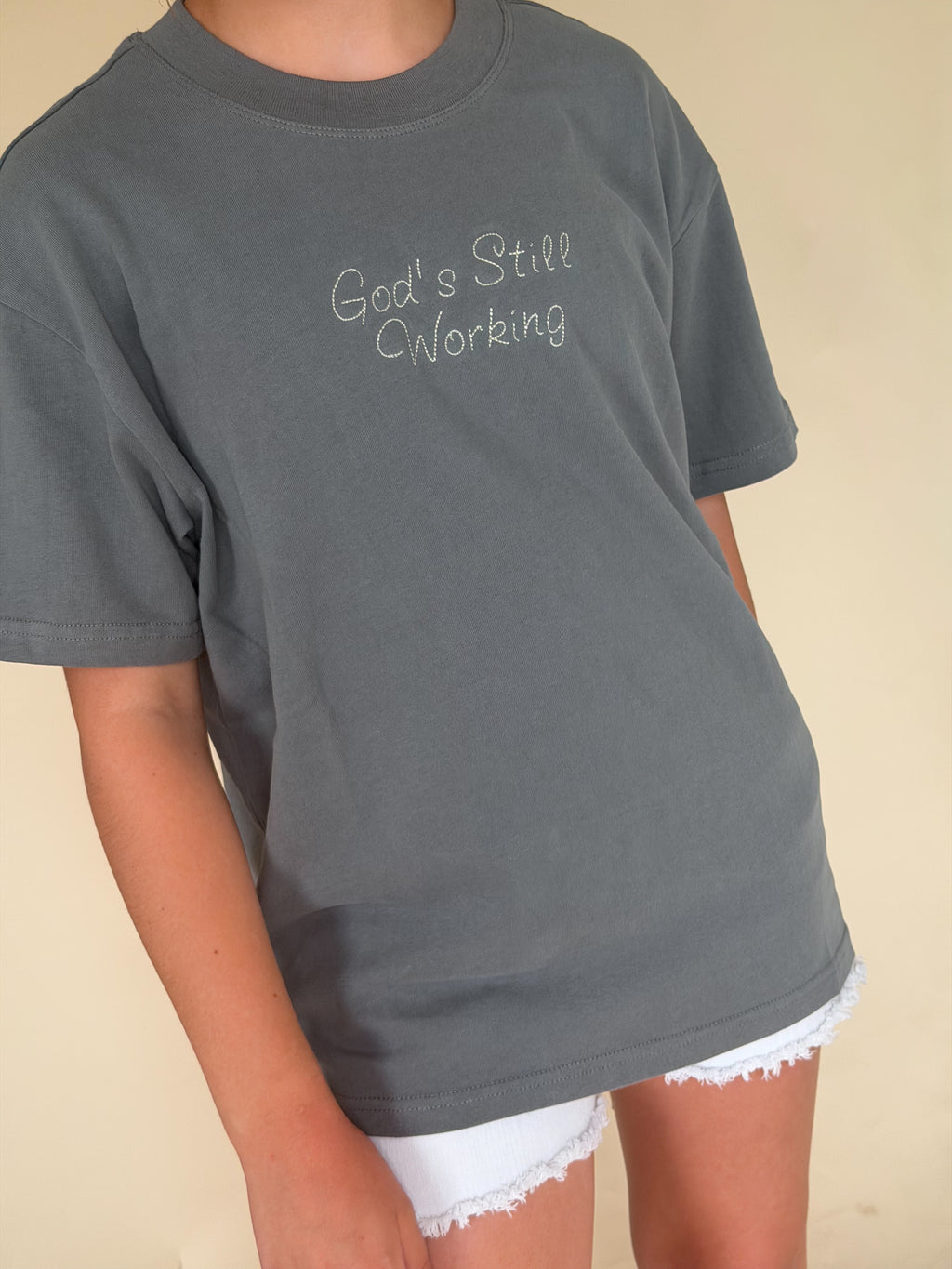 God's Still Working Tee
